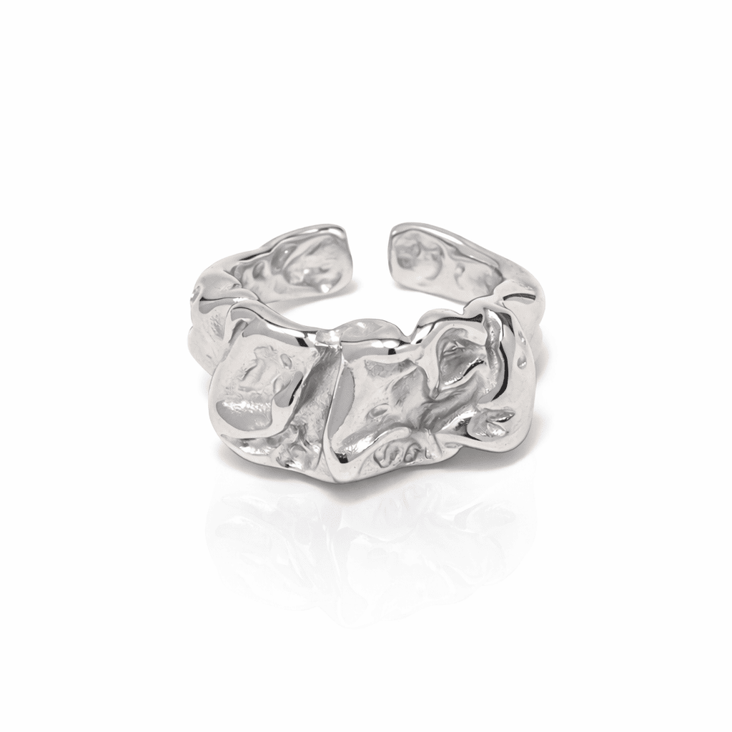 Organic silver statement ring with sculptural molten texture