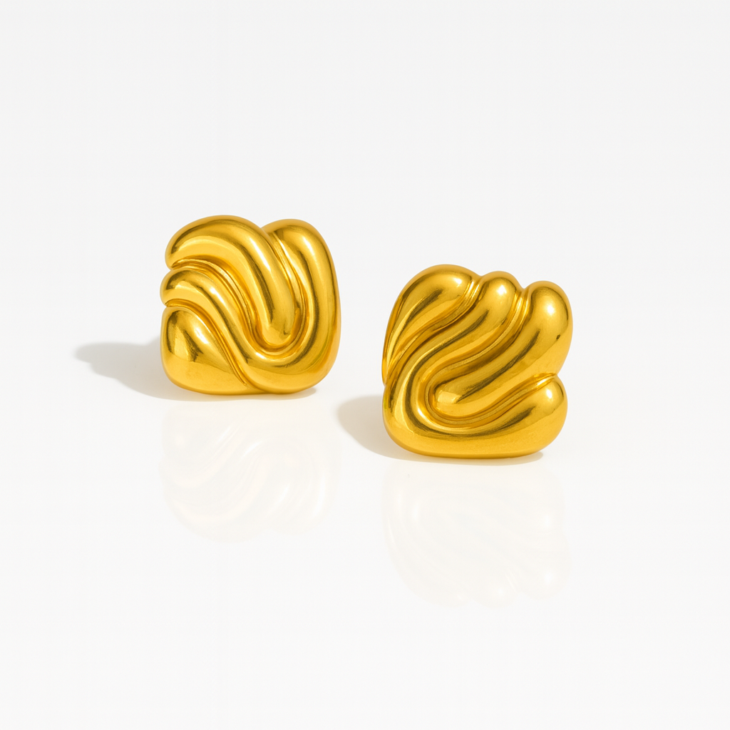Gold stud earrings with fluid wavy design