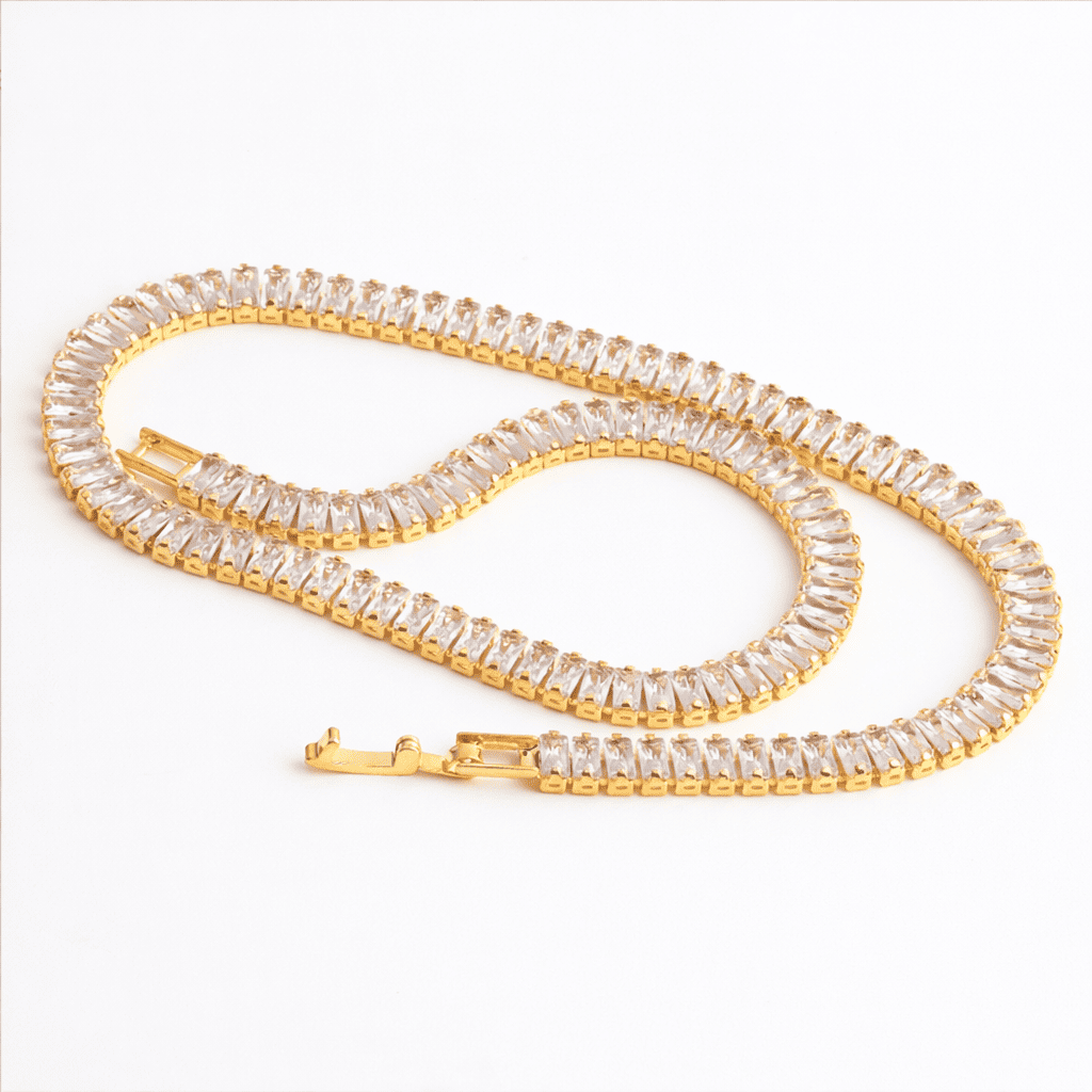 Gold crystal tennis necklace with clear stone detailing
