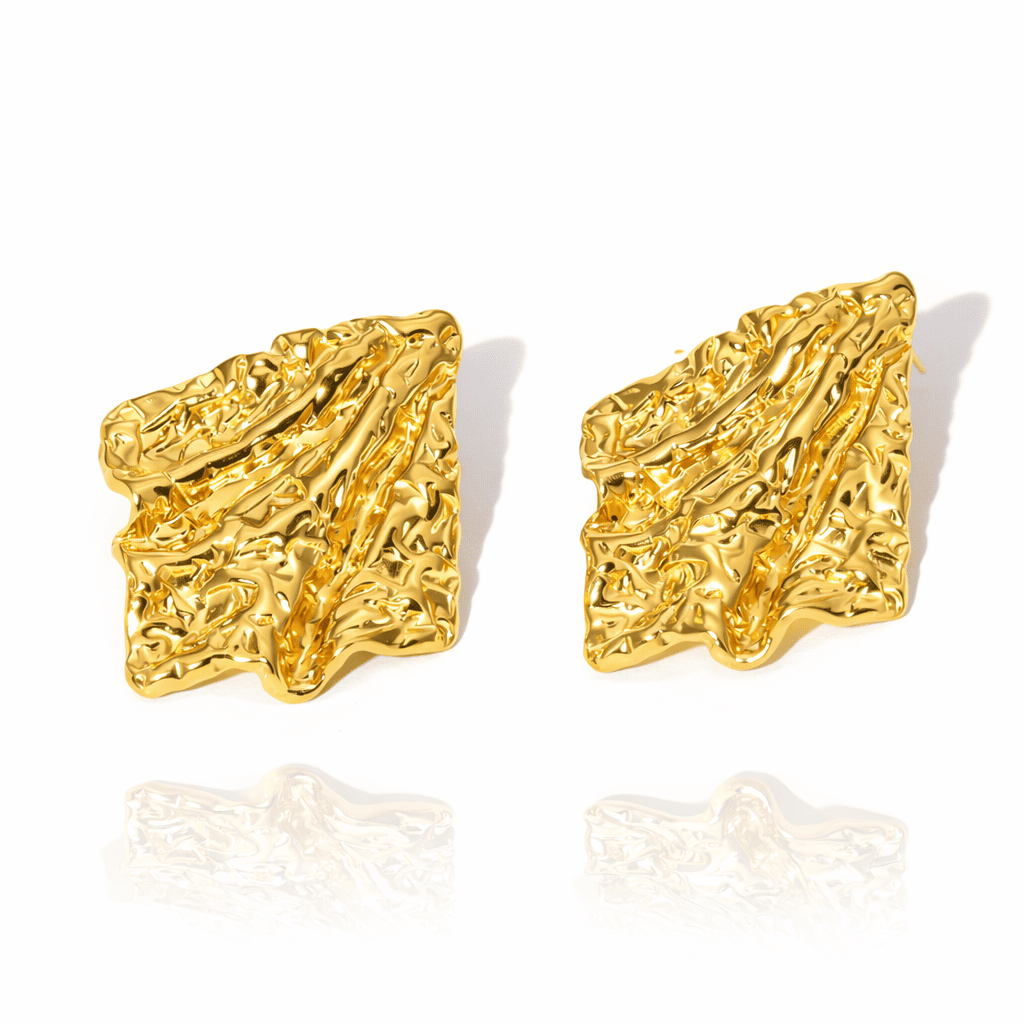 Textured organic gold earrings with modern sculptural finish