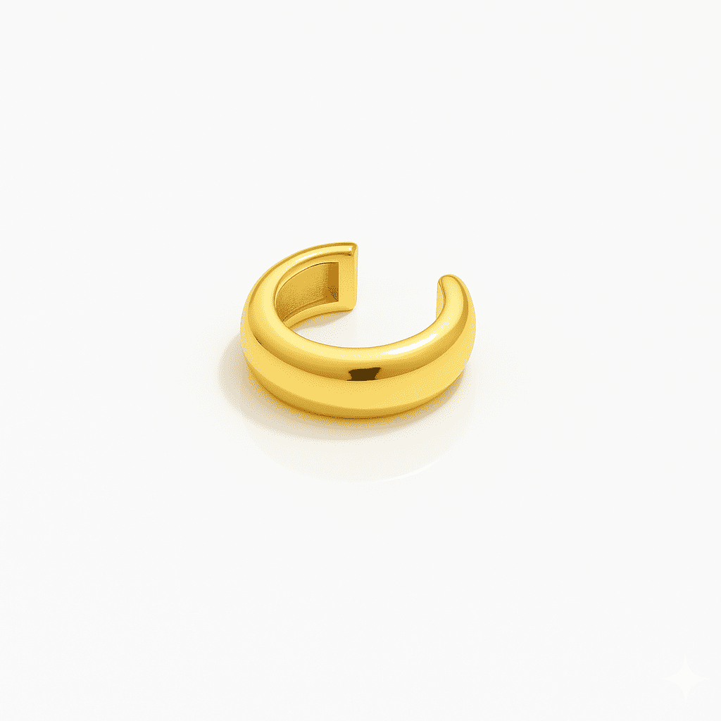Bold dome gold ear cuff with a smooth polished surface, minimalist stainless steel jewelry piece displayed on a white background.